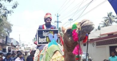 Kerala groom arrives for wedding on camel with a placard to protest against CAA
