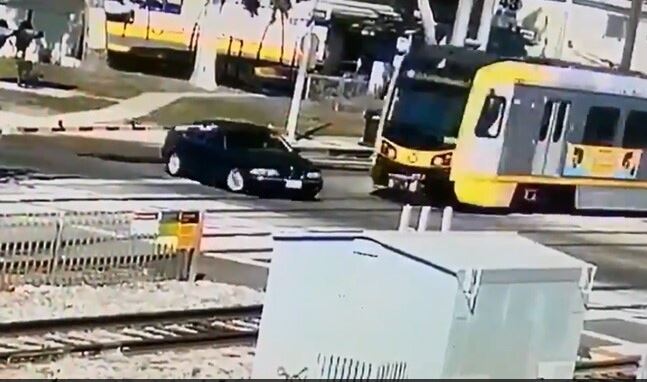 Horrifying Footage Shows BMW Getting Crushed By Train
