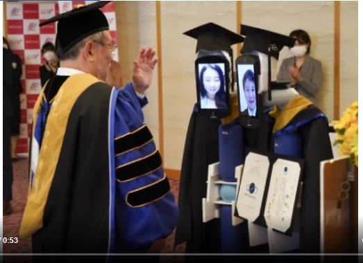 Japan An example of social distancing. In convocation robots replaced students to take degrees