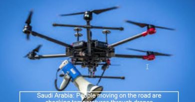 Saudi Arabia_ People wandering on the road are checking the temperature through drone