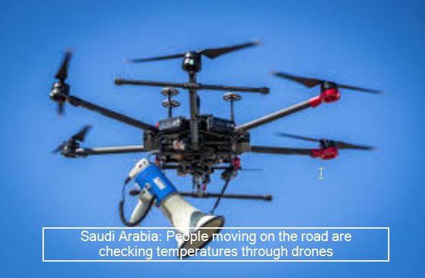 Saudi Arabia_ People wandering on the road are checking the temperature through drone