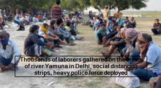 Thousands of laborers gathered on the banks of river Yamuna in Delhi, social dis