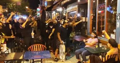 BLM protesters outside a restaurant in Washington DC on Monday as part of protests following the shooting of Jacob Blake in Wisconsin