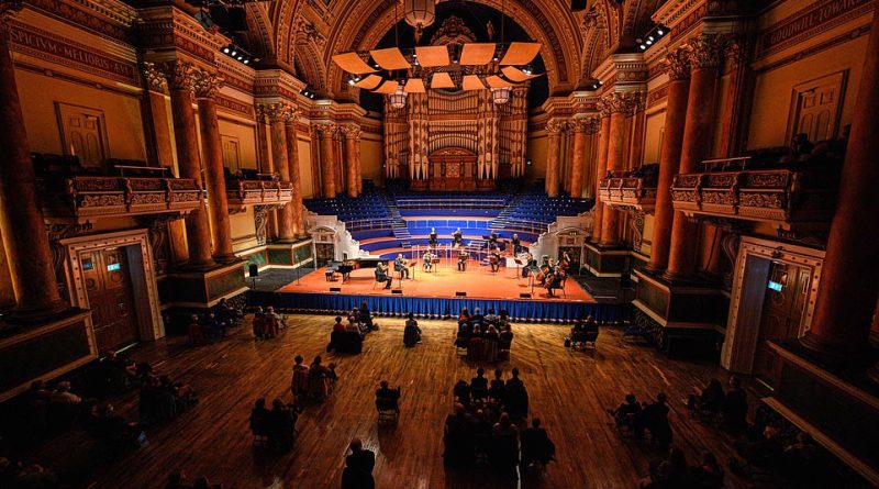 Overjoyed classical-music enthusiasts eagerly gathered for a socially-distanced concert at Leeds Town Hall last night (pictured)