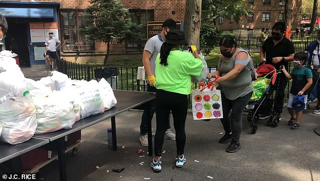 Nearly 400 volunteers across Queens are working to cope with the surge in demand for food