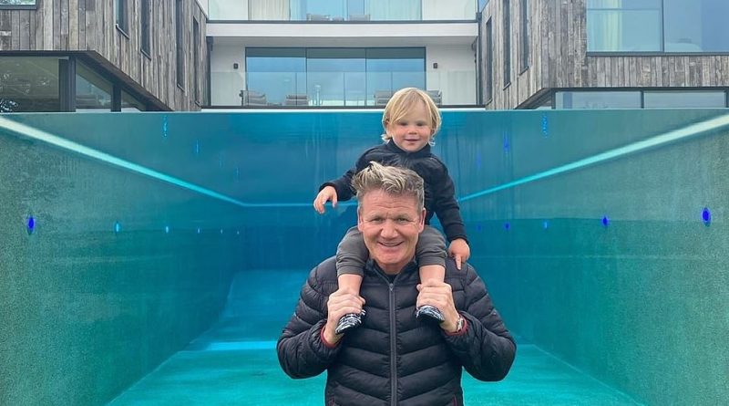 Wow! Gordon Ramsay has shared a glimpse of his incredible new swimming pool at his £4 million holiday home in Cornwall while holding his son Oscar, 15 months, in an Instagram snap