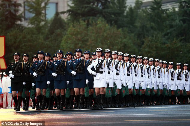 Troops prepare for a military parade marking the 70th anniversary of the founding of the People