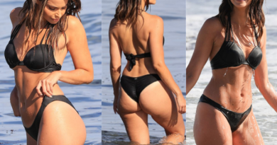 Jennifer Lahmers SEXY TV host sets pulses racing as she flaunts her incredible figure in a black bikini while splashing around in the ocean