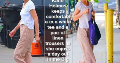 Katie Holmes keeps comfortable in a white tee and a pair of linen trousers as she enjoys a day out in the Big Apple