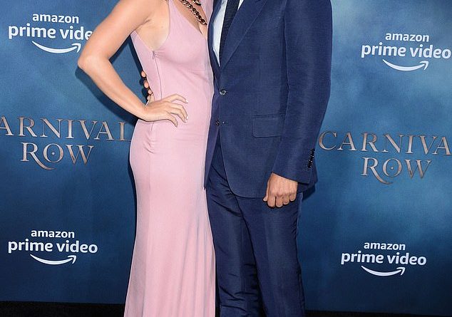Welcome: Katy Perry has given birth to her first child, daughter Daisy Dove, with fiancé Orlando Bloom on Wednesday; Orlando and Katy pictured in 2019