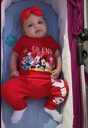 Chloe Davis, 18, from St Albans, shared a video to TikTok of her newborn Scarlett-Rose lying in her crib in a sweet red outfit and bow