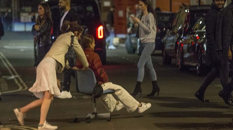 In Soho, London, one reveller was pictured pushing another through the street on an office chair this Bank Holiday Weekend