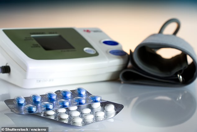 Millions of healthy people should be prescribed blood pressure medication because the pills can prevent heart attacks later in life, scientists say (file)