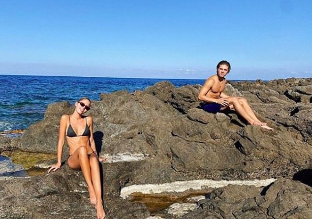 Must be nice: Princess Olympia has been living it up in Greece for the past month, and today hung seaside with her family in a black bikini