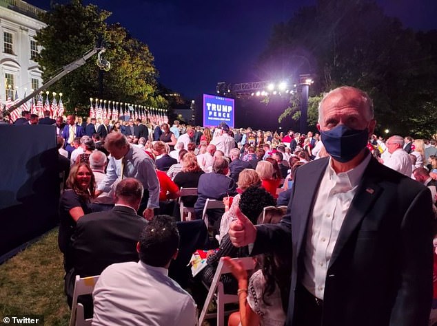 Sen. Thom Tillis, a North Carolina Republican facing a tough re-election fight, posted a photo to Twitter showing him at President Donald Trump