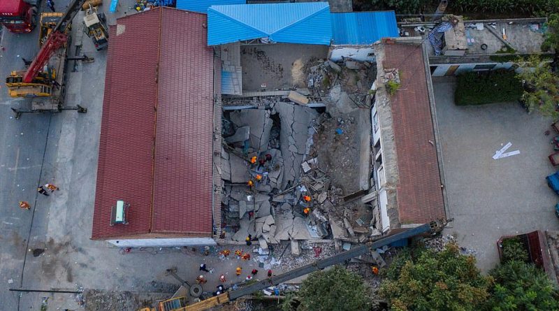 A two-storey restaurant in China collapsed this morning (emergency services pictured) killing seventeen people, according to state media