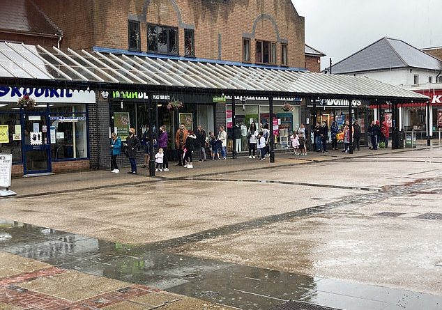 Stressed-out parents have been stuck in eight-hour queues this week as they rushed to buy last-minute school uniforms ahead of the start of term. Pictured: Lines in Eastleigh, Hampshire