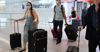 Passengers arrive at Heathrow Airport in London, as it