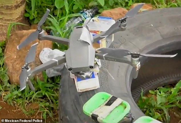 Mexican authorities discovered a dozen of quadcopter-style drones installed small explosives  (pictured) in an abandoned car in Michoacan on July 25