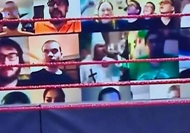 A man wearing a Ku Klux Klan hood appeared in a World Wrestling Entertainment broadcast when a fan uploaded the image of a KKK rally into the virtual audience surrounding the ring