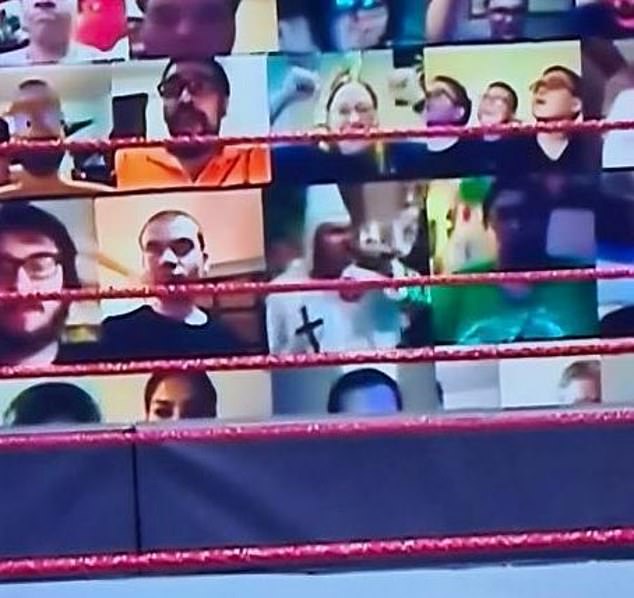 A man wearing a Ku Klux Klan hood appeared in a World Wrestling Entertainment broadcast when a fan uploaded the image of a KKK rally into the virtual audience surrounding the ring