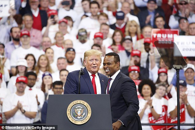 In his successful bid to become Kentucky's first black AG, Cameron - who was born and raised in the state - received an endorsement from President Trump. They are pictured at a Trump rally in Kentucky in November last year