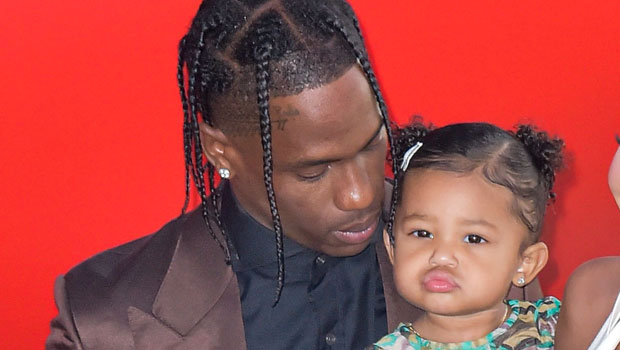 Stormi Webster, 2, Hops On Top Of Dad Travis Scott’s Bright Yellow Taxi Cab In Cute New Pic