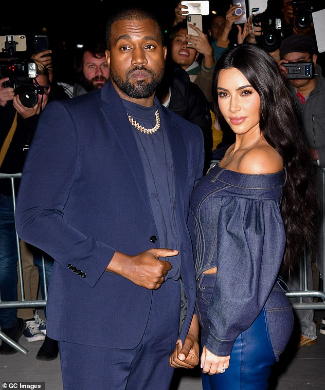 Marriage struggles: Kim previously hit back at reports that she was 'torn' on divorcing Kanye, following their emotional crisis talks in July