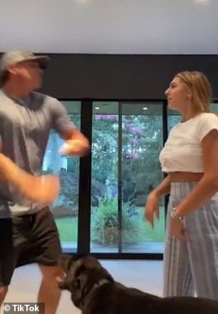 Take that! CNN host Chris Cuomo, 50, threw a punch at his 17-year-old daughter Bella during a funny play fight on TikTok