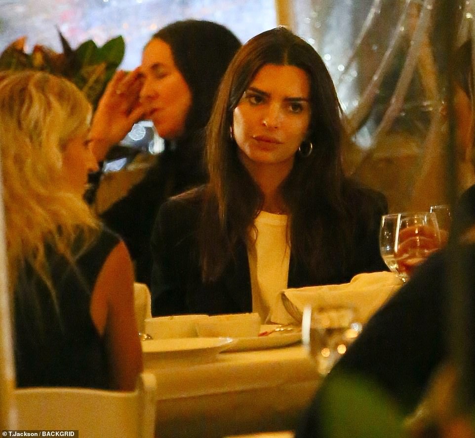 Emily Ratajkowski was pictured on Tuesday night for the first time since the photographer she accused of sexual assault hit back against her claims