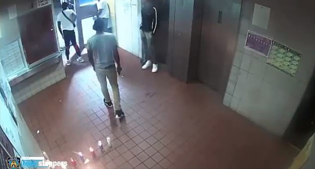 The New York Police Department released surveillance footage of a gun fight the took place inside an apartment building lobby on August 25