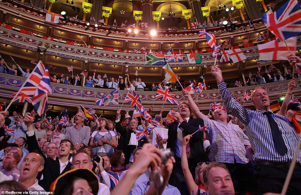 Prommers wave flags at the Last Night of the Proms at the Royal Albert Hall in West London on September 8, 2012