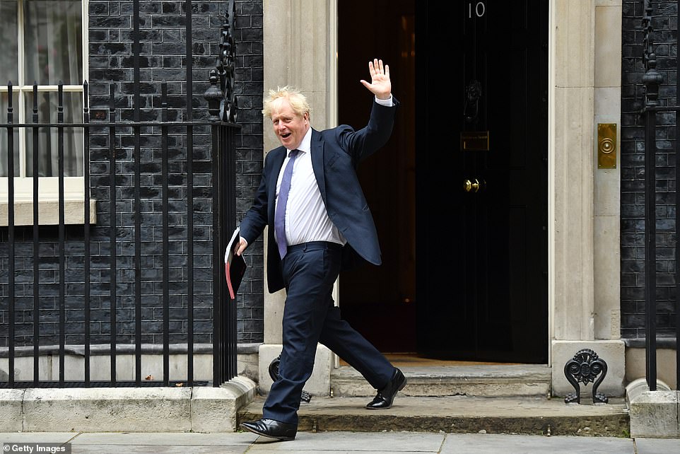Boris Johnson (pictured leaving Downing Street today) and his senior ministers are holding a socially-distanced meeting with concerns rising about infections - which have neared 3,000 for two days running