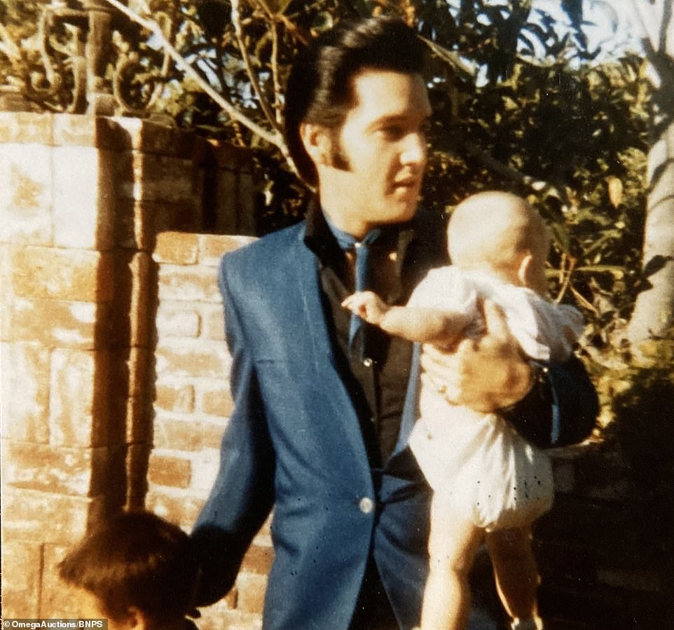 Rare photographs showing Elvis Presley holding baby daughter and riding ...