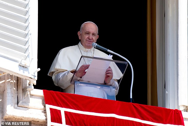 Pope Francis speaks during his weekly address from the window at St Peter