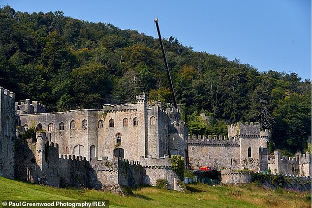 Drama: The show, which was forced to move location from Australia to the UK due to Covid, is said to be 'under threat' as the country is hit with new lockdown rules (Gwrych Castle pictured)