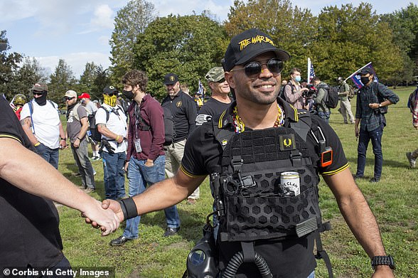 Enrique Tarrio is currently serving in the role of chairman for the Proud Boys. Tarrio is pictured during an Oregon rally this month