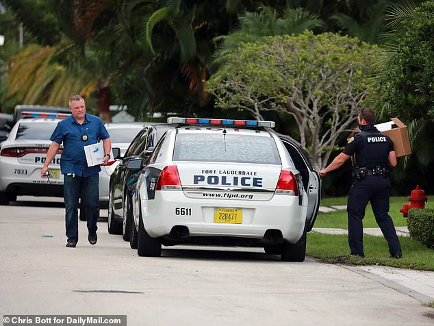 DailyMail.com published photos on Monday which showed officers carrying boxes believed to contain guns out of Parscale's home prior to receiving a judge's approval for the seizure