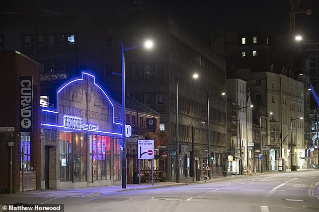 An empty Westgate Street in Cardiff, Wales, after pubs, bars and restaurants were subject to a 10pm curfew
