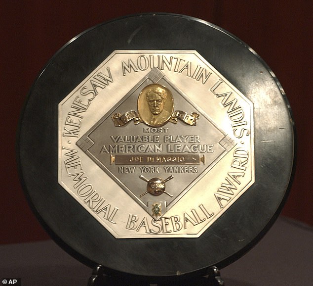 In this file photo, a Joe DiMaggio 1947 MVP Award Plaque is displayed at a news conference in New York. The plaque features the name and image of Kenesaw Mountain Landis