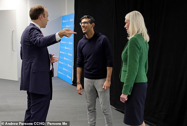 Pictured: Rishi Sunak with the Health Secretary Matt Hancock (left) and the Conservative party Chairman Amanda Milling (right) before going into the studio to rehearse his speech
