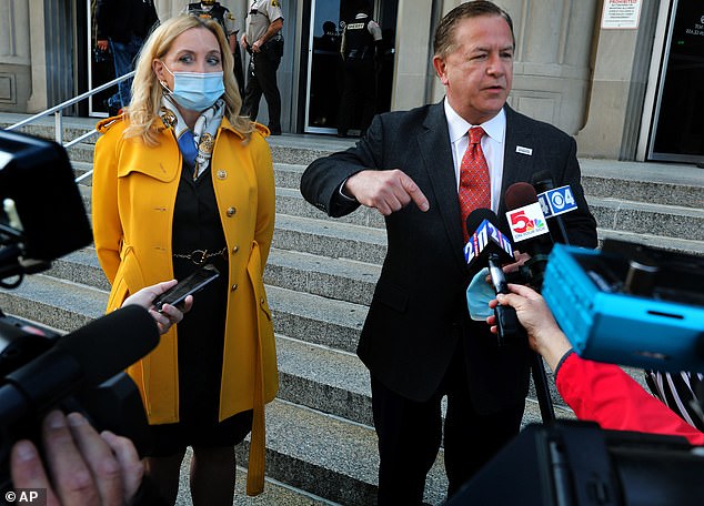 While walking outside the courtroom Tuesday, the McCloskeys and Schwartz stopped to speak with reporters gathered outside