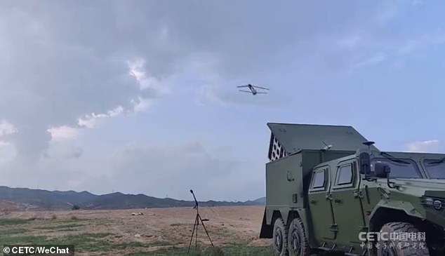 A drone is seen in the clip opening up after being catapulted into the air by the military truck