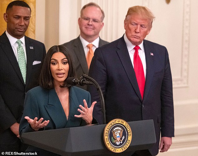 Grateful: Kim went on to express that she is 'extremely grateful' for the current administration's part in working towards criminal justice reform; Kim and Trump pictured in 2019
