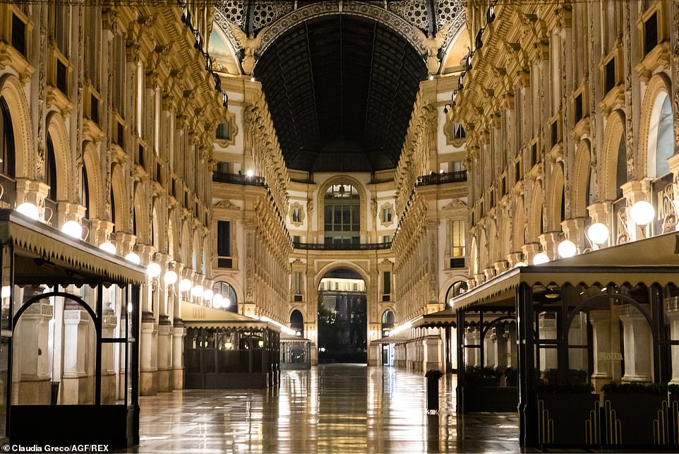 Milan's luxurious Vittorio Emanuele II shopping gallery is deserted after the curfew was imposed, with Lombardy once again suffering the most coronavirus cases in Italy