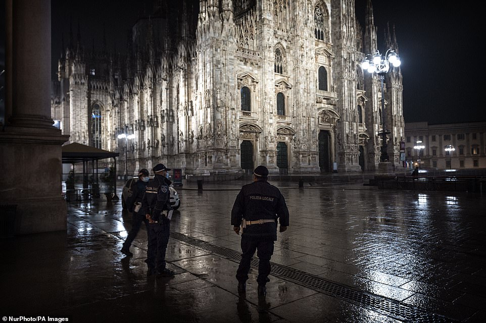 Italian police remained in the Duomo square last night to enforce the curfew mandated by Lombardy's regional governor