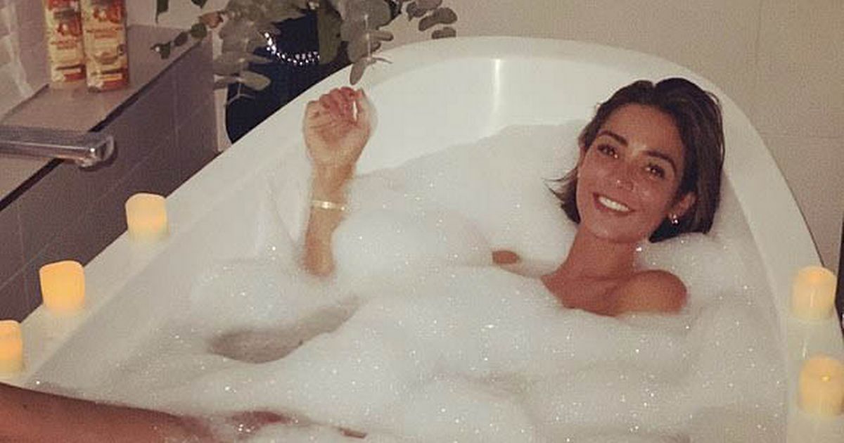 Frankie Bridge turns heads as she showcases natural beauty reclining in the bath