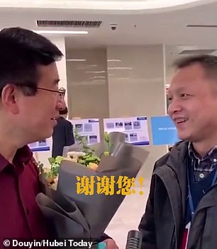 Dr Yi appeared in public for the first time yesterday to thank a doctor who helped save him