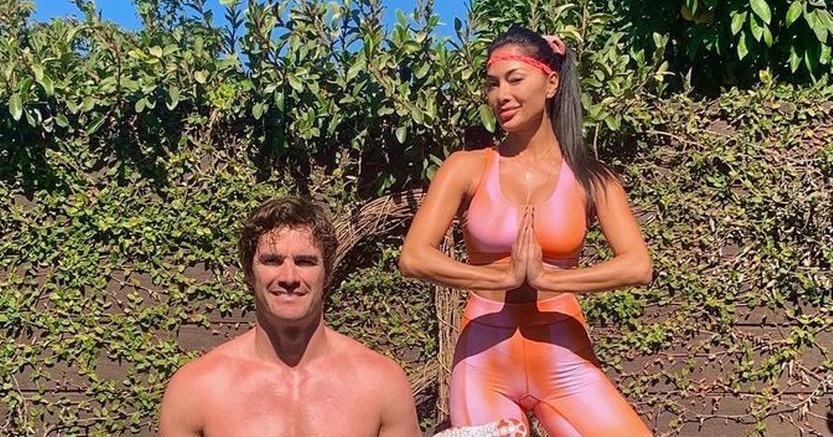 Nicole Scherzinger dons skintight orange lycra to perform incredible yoga feat