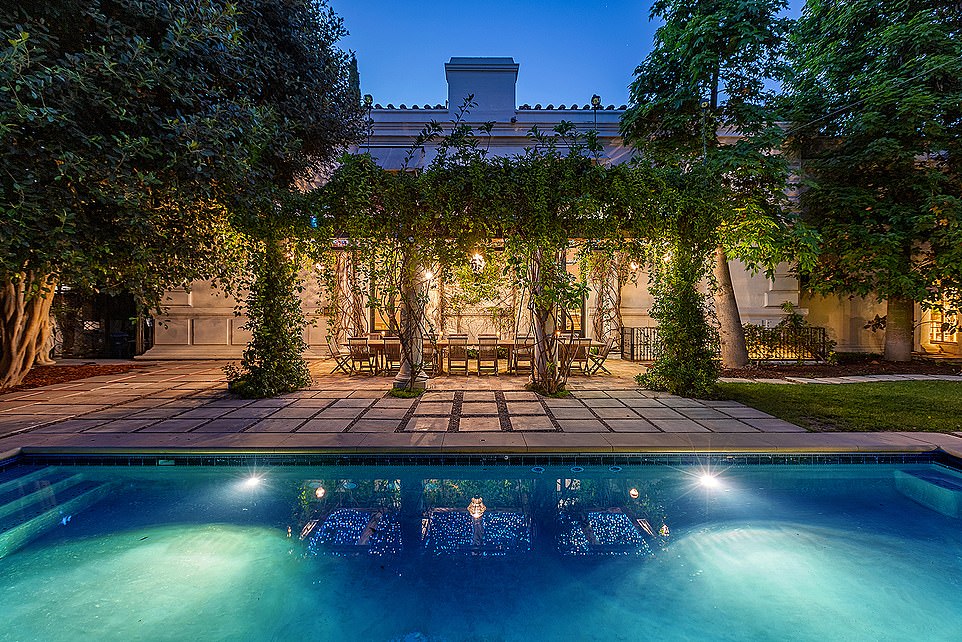 Bridget Fonda and husband Danny Elfman list neighboring LA mansions for a combined $14.6million